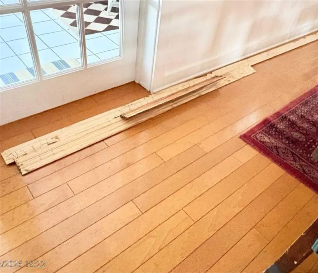 Dry It, Don't Demolish It: How We Save Original Wood Floors