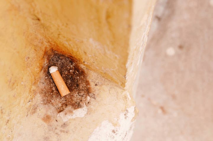 Cigarette with Yellow Wall_shutterstock_1501655819.jpg